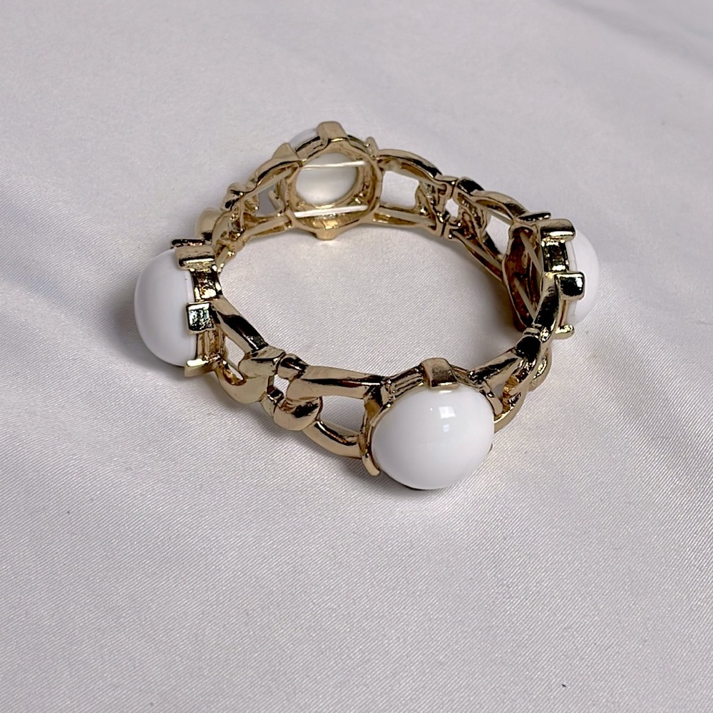 3/10$ Gold and white statement bangle bracelet